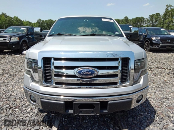 2011 Ford F-150 XL with VIN 1FTEX1EM0BFC72857, listed as a Copart auction lot 61140985 with 180,073 mi miles and Salvage title. Bid and sale history available at DreamBid. Image 5.