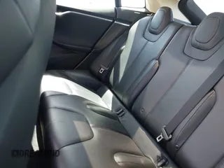 2013 Tesla Model S with VIN 5YJSA1CN5DFP11381, listed as a IAAI auction lot 42087803 with 146,818 mi miles and . Bid and sale history available at DreamBid. Image 8.