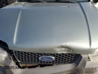 2005 Ford Escape Hybrid with VIN 1FMCU96HX5KC45835, listed as a Copart auction lot 55238065 with 223,769 mi miles and Salvage title. Bid and sale history available at DreamBid. Image 12.