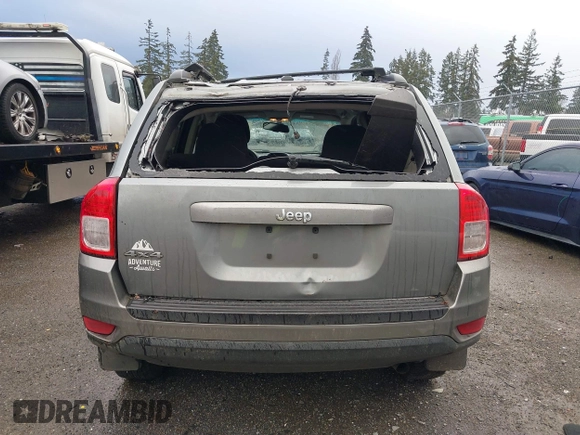 2013 Jeep Compass Sport with VIN 1C4NJDBB5DD101879, listed as a IAAI auction lot 41208112 with 168,300 mi miles. Bid and sale history available at carsss.com. Image 16.