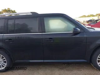 2014 Ford Flex SEL z VIN 2FMGK5C8XEBD24744, wystawiony jako IAAI lot #42365734 z przebiegiem 209 904 mil mil oraz . Historia ofert i sprzedaży dostępna na DreamBid. Obrazek 13.