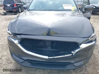 2017 Mazda CX-5 Touring with VIN JM3KFACLXH0125819, listed as a IAAI auction lot 41687038 with 101,769 mi miles. Bid and sale history available at carsss.com. Image 6.