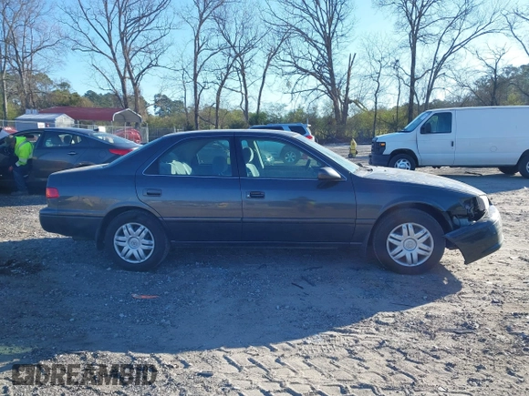 2001 Toyota Camry CE with VIN 4T1BG22K41U842473, listed as a IAAI auction lot 41858322 with 203,696 mi miles. Bid and sale history available at carsss.com. Image 13.