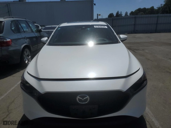 2020 Mazda Mazda3 Hatchback Premium Package with VIN JM1BPANM1L1153202, listed as a Copart auction lot 57854234 with 30,425 mi miles and Salvage Title. Bid and sale history available at carsss.com. Image 5.