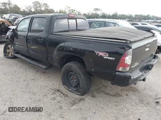 2013 Toyota Tacoma with VIN 3TMMU4FN5DM052257, listed as a IAAI auction lot 41260265 with 121,882 mi miles. Bid and sale history available at carsss.com. Image 3.