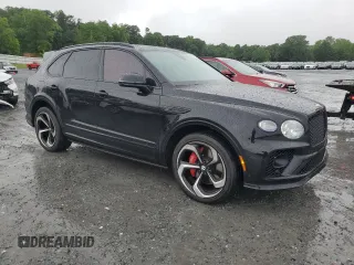 2022 Bentley Bentayga V8 z VIN SJAAM2ZV8NC039607, wystawiony jako Copart lot #54888564 z przebiegiem 15 561 mil mil oraz . Historia ofert i sprzedaży dostępna na DreamBid. Obrazek 4.