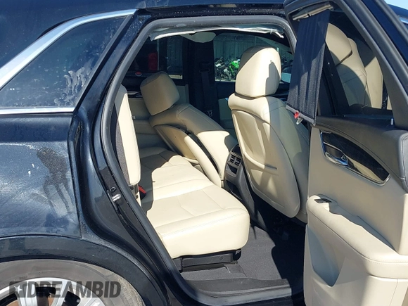 2019 Cadillac XT5 FWD with VIN 1GYKNARS7KZ117913, listed as a IAAI auction lot 41228767 with 105,335 mi miles and . Bid and sale history available at carsss.com. Image 8.