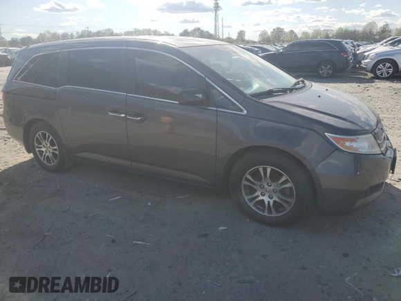 2012 Honda Odyssey EX-L with VIN 5FNRL5H64CB105215, listed as a Copart auction lot 53634125 with 149,310 mi miles and Salvage Title. Bid and sale history available at carsss.com. Image 4.