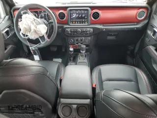 2023 Jeep Wrangler Rubicon with VIN 1C4JJXFG4PW523432, listed as a Copart auction lot 51642975 with 23,631 mi miles and Salvage title. Bid and sale history available at DreamBid. Image 8.