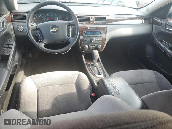 2014 Chevrolet Impala LT with VIN 2G1WB5E3XE1151209, listed as a Copart auction lot 51326375 with 124,533 mi miles and Salvage Title. Bid and sale history available at DreamBid. Image 8.
