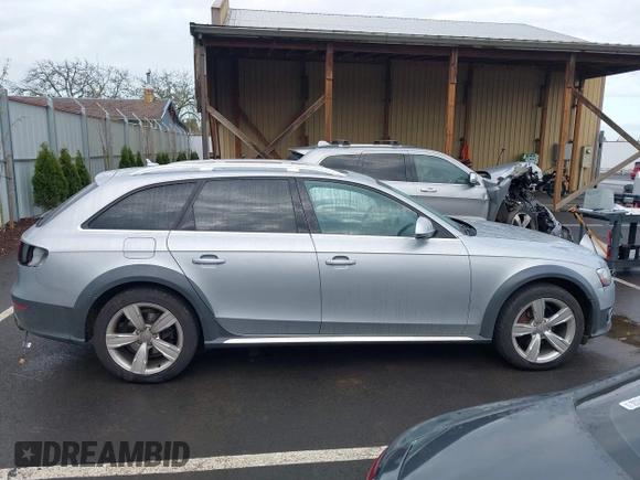 2015 Audi allroad A4 Premium Plus z VIN WA1UFAFL3FA017363, wystawiony jako IAAI lot #41890816 z przebiegiem 109 954 mil mil oraz . Historia ofert i sprzedaży dostępna na DreamBid. Obrazek 14.