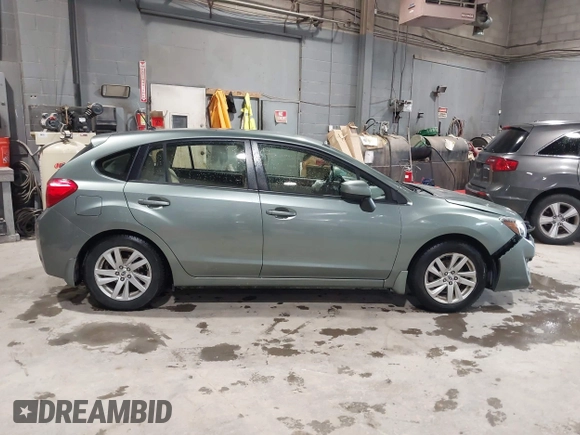 2015 Subaru Impreza Premium z VIN JF1GPAC60FH251553, wystawiony jako IAAI lot #42330354 z przebiegiem 99 830 mil mil oraz . Historia ofert i sprzedaży dostępna na DreamBid. Obrazek 13.