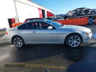 2006 BMW 6 Series 650Ci with VIN WBAEH13406CR50897, listed as a IAAI auction lot 41237283 with 98,027 mi miles. Bid and sale history available at carsss.com. Image 13.