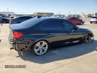 2013 BMW 3 Series 335i with VIN WBA3A9G57DNP36052, listed as a Copart auction lot 50204825 with 158,102 mi miles and Salvage title. Bid and sale history available at DreamBid. Image 3.