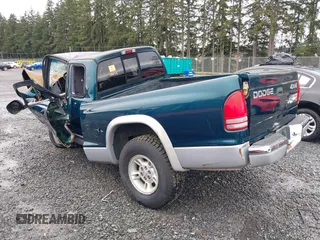 1997 Dodge Dakota z VIN 1B7GG23X9VS242604, wystawiony jako IAAI lot #41772203 z przebiegiem Nie podano mil oraz . Historia ofert i sprzedaży dostępna na DreamBid. Obrazek 3.