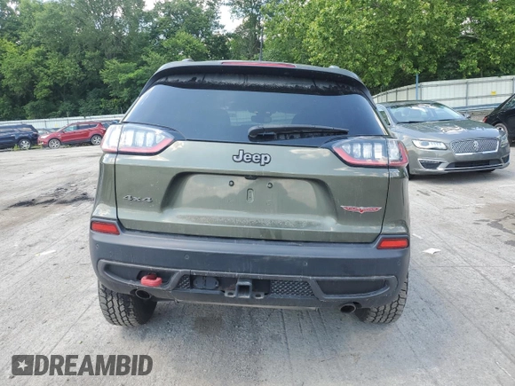 2021 Jeep Cherokee Trailhawk z VIN 1C4PJMBX0MD185078, wystawiony jako Copart lot #63264765 z przebiegiem 92 393 mil mil oraz Szkoda całkowita • Salvage title. Historia ofert i sprzedaży dostępna na DreamBid. Obrazek 6.