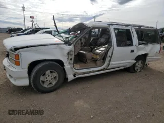 1999 GMC Suburban z VIN 1GDFK16R7XJ722940, wystawiony jako Copart lot #49927735 z przebiegiem 202 858 mil mil oraz Szkoda całkowita • Salvage title. Historia ofert i sprzedaży dostępna na DreamBid. Obrazek 1.