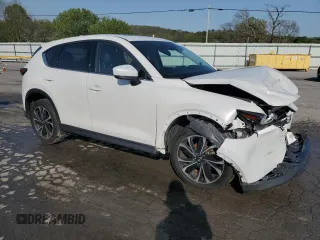 2023 Mazda CX-5 2.5 S Premium Package with VIN JM3KFBDM1P0187492, listed as a Copart auction lot 52923685 with 0 mi miles and Salvage Title. Bid and sale history available at carsss.com. Image 4.