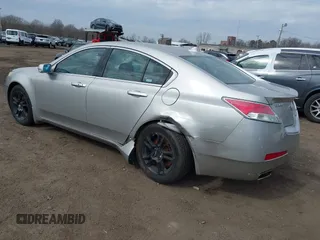 2009 Acura TL Tech with VIN 19UUA86519A013039, listed as a IAAI auction lot 41656570 with 241,217 mi miles. Bid and sale history available at carsss.com. Image 3.