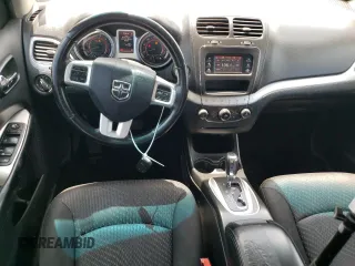 2015 Dodge Journey American Value with VIN 3C4PDCAB2FT547836, listed as a Copart auction lot 54337615 with 169,288 mi miles and Salvage Title. Bid and sale history available at DreamBid. Image 8.