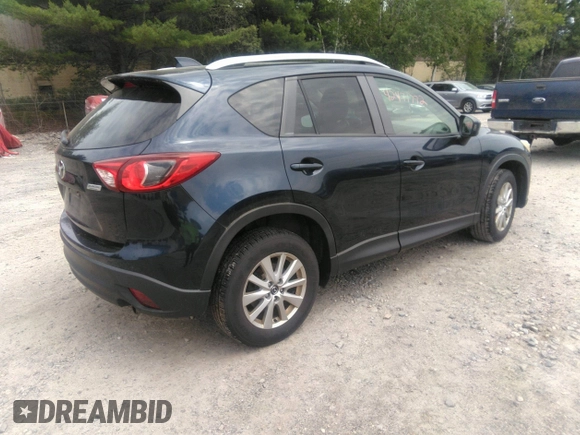 2014 Mazda CX-5 Touring z VIN JM3KE2CYXE0429149, wystawiony jako IAAI lot #42471772 z przebiegiem 222 440 mil mil oraz . Historia ofert i sprzedaży dostępna na DreamBid. Obrazek 4.