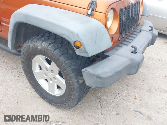 2011 Jeep Wrangler Sport with VIN 1J4AA2D1XBL579882, listed as a IAAI auction lot 42122353 with 153,885 mi miles and . Bid and sale history available at carsss.com. Image 6.