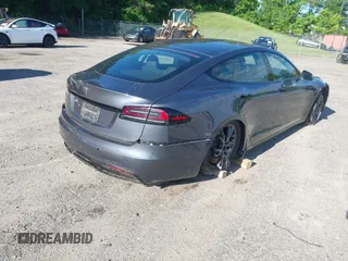 2022 Tesla Model S with VIN 5YJSA1E57NF479056, listed as a IAAI auction lot 42091009 with 78,272 mi miles and . Bid and sale history available at DreamBid. Image 4.