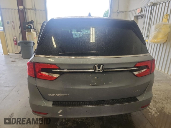 2023 Honda Odyssey Elite with VIN 5FNRL6H90PB071988, listed as a Copart auction lot 58589585 with 12,998 mi miles and Salvage title. Bid and sale history available at DreamBid. Image 6.
