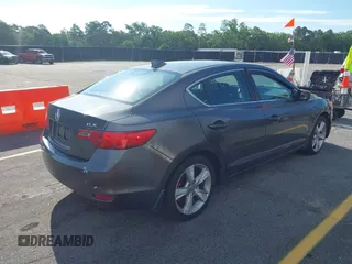 2014 Acura ILX z VIN 19VDE1F39EE002881, wystawiony jako IAAI lot #42270605 z przebiegiem 172 356 mil mil oraz . Historia ofert i sprzedaży dostępna na DreamBid. Obrazek 4.