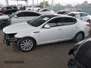 2015 Kia Optima EX z VIN 5XXGN4A71FG504390, wystawiony jako IAAI lot #42449045 z przebiegiem 171 352 mil mil oraz . Historia ofert i sprzedaży dostępna na DreamBid. Obrazek 15.
