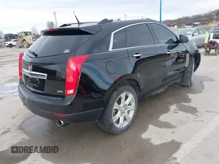 2013 Cadillac SRX Performance Collection with VIN 3GYFNHE34DS595277, listed as a IAAI auction lot 41618126 with 118,141 mi miles. Bid and sale history available at carsss.com. Image 4.