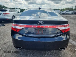 2013 Hyundai Azera z VIN KMHFH4JG4DA311870, wystawiony jako Copart lot #65090225 z przebiegiem 271 082 mil mil oraz Czysty tytuł • Clean title. Historia ofert i sprzedaży dostępna na DreamBid. Obrazek 6.