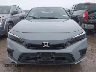 2023 Honda Civic Sport z VIN 2HGFE2F56PH567170, wystawiony jako IAAI lot #41700433 z przebiegiem 38 877 mil mil oraz . Historia ofert i sprzedaży dostępna na DreamBid. Obrazek 12.
