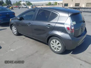 2014 Toyota Prius One with VIN JTDKDTB33E1061088, listed as a IAAI auction lot 42040762 with 206,735 mi miles and . Bid and sale history available at DreamBid. Image 3.