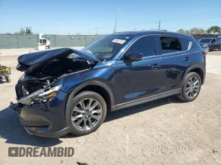 2021 Mazda CX-5 Signature with VIN JM3KFBEYXM0453766, listed as a Copart auction lot 45902795 with 26,066 mi miles and Salvage Title. Bid and sale history available at carsss.com. Image 1.