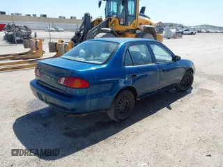 2000 Toyota Corolla VE with VIN 1NXBR12EXYZ374998, listed as a IAAI auction lot 42248162 with 230,869 mi miles and . Bid and sale history available at DreamBid. Image 4.