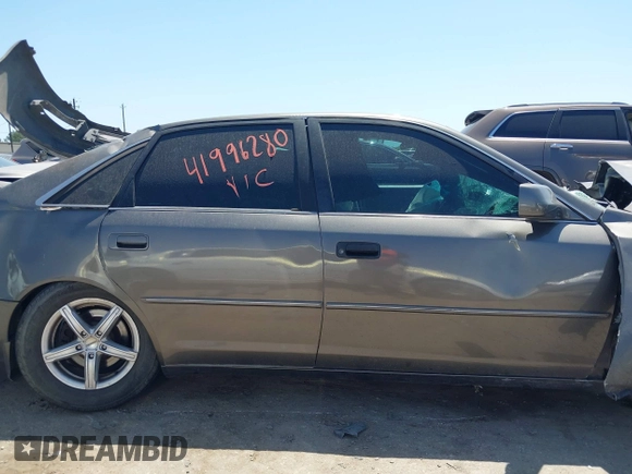 2004 Toyota Avalon XL z VIN 4T1BF28B24U345341, wystawiony jako IAAI lot #41998280 z przebiegiem Nie podano mil oraz . Historia ofert i sprzedaży dostępna na DreamBid. Obrazek 13.