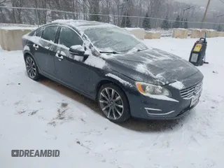 2015 Volvo S60 T5 Premier with VIN YV1612TK6F1348608, listed as a IAAI auction lot 41229153 with 73,019 mi miles. Bid and sale history available at carsss.com. Image 1.
