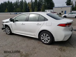 2023 Toyota Corolla Hybrid LE with VIN JTDBDMHE2PJ002549, listed as a Copart auction lot 50378594 with 5,028 mi miles and Salvage Title. Bid and sale history available at carsss.com. Image 2.
