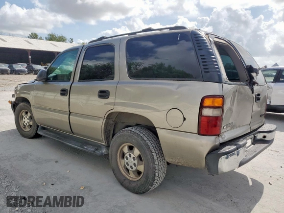 2002 Chevrolet Tahoe LS z VIN 1GNEC13V92R136479, wystawiony jako Copart lot #59803055 z przebiegiem 165 718 mil mil oraz Czysty tytuł • Clean title. Historia ofert i sprzedaży dostępna na DreamBid. Obrazek 2.
