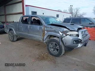 2017 Toyota Tacoma SR5 with VIN 3TMDZ5BN3HM025433, listed as a IAAI auction lot 41058797 with 68,355 mi miles. Bid and sale history available at carsss.com. Image 1.