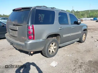 2007 GMC Yukon SLT with VIN 1GKFC13J57J103418, listed as a IAAI auction lot 41955682 with 318,338 mi miles. Bid and sale history available at carsss.com. Image 4.