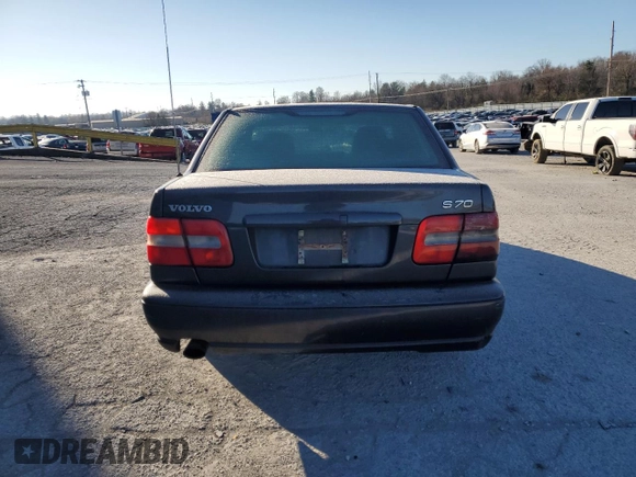 1998 Volvo S70 z VIN YV1LS553XW3480105, wystawiony jako Copart lot #83552564 z przebiegiem 200 181 mil mil oraz Nie do naprawy • Non repairable. Historia ofert i sprzedaży dostępna na DreamBid. Obrazek 6.