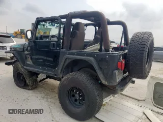 2005 Jeep Wrangler X with VIN 1J4FA39S25P367360, listed as a Copart auction lot 57504365 with 112,125 mi miles and Salvage title. Bid and sale history available at DreamBid. Image 2.