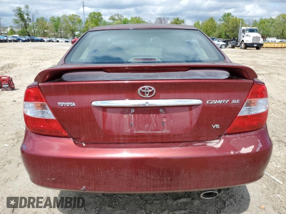 2003 Toyota Camry LE z VIN JTDBF30K530091667, wystawiony jako Copart lot #54576175 z przebiegiem 230 772 mil mil oraz Czysty tytuł • Clean title. Historia ofert i sprzedaży dostępna na DreamBid. Obrazek 6.