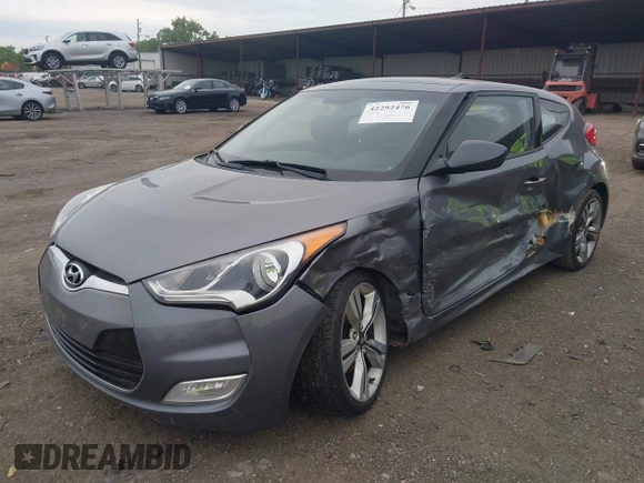 2012 Hyundai Veloster w/Gray Int z VIN KMHTC6AD3CU069427, wystawiony jako IAAI lot #42292476 z przebiegiem 166 960 mil mil oraz . Historia ofert i sprzedaży dostępna na DreamBid. Obrazek 2.