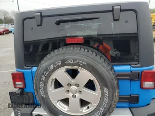 2012 Jeep Wrangler Arctic z VIN 1C4AJWBG3CL148046, wystawiony jako Copart lot #54186285 z przebiegiem 156 639 mil mil oraz Szkoda całkowita • Salvage title. Historia ofert i sprzedaży dostępna na DreamBid. Obrazek 11.