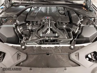 2023 BMW M8 Competition with VIN WBSDZ0C02PCM75573, listed as a IAAI auction lot 41618692 with 8,292 mi miles. Bid and sale history available at carsss.com. Image 10.