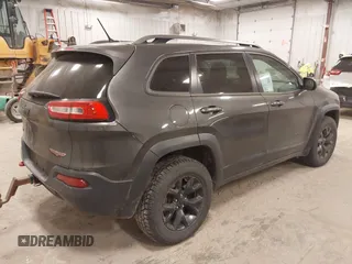 2015 Jeep Cherokee Trailhawk с VIN 1C4PJMBSXFW525218, выставлен на аукционе IAAI как лот 42032130 с пробегом 164 289 миль миль и . История ставок и продаж доступна на DreamBid. Изображение 4.