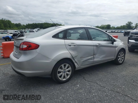 2013 Ford Fiesta SE z VIN 3FADP4BJ9DM108667, wystawiony jako Copart lot #58542295 z przebiegiem 94 812 mil mil oraz Szkoda całkowita • Salvage title. Historia ofert i sprzedaży dostępna na DreamBid. Obrazek 3.